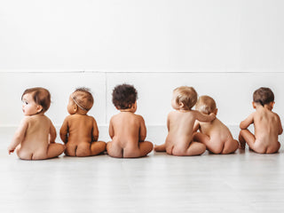 6 babies sitting together