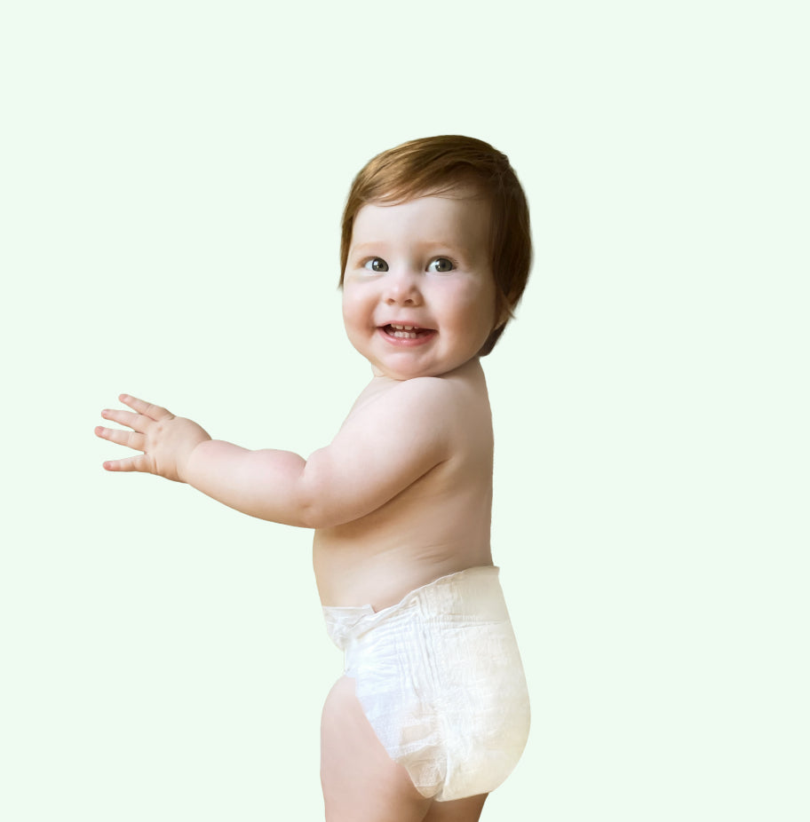 Baby wearing a diaper on a white background